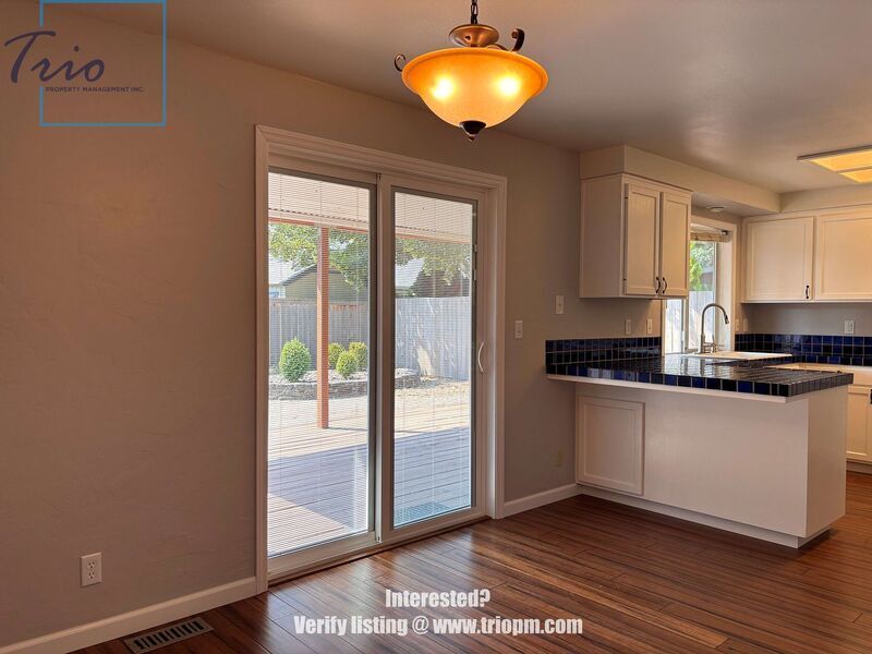 Spacious 3-Bedroom Home with Fenced Yard, Covered Deck and Two-Car Garage property image
