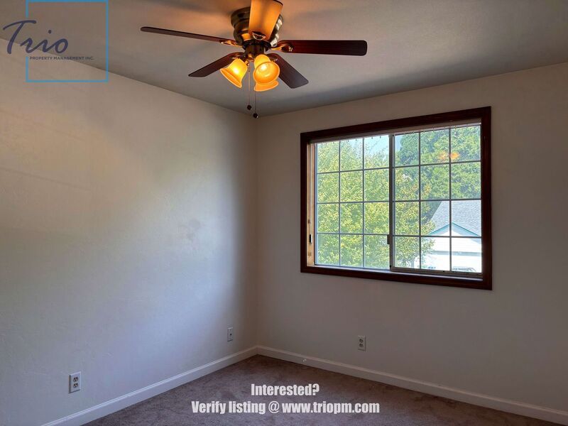 Spacious 3-Bedroom Home with Fenced Yard, Covered Deck and Two-Car Garage property image