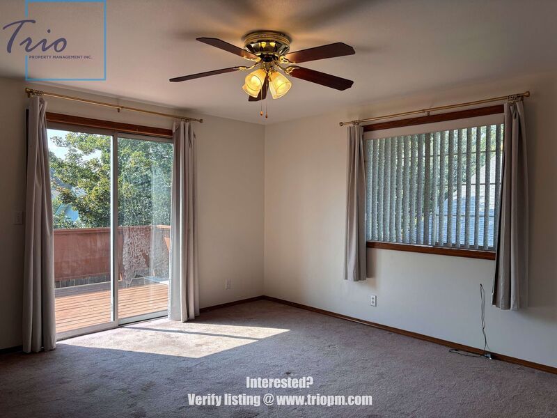 Spacious 3-Bedroom Home with Fenced Yard, Covered Deck and Two-Car Garage property image