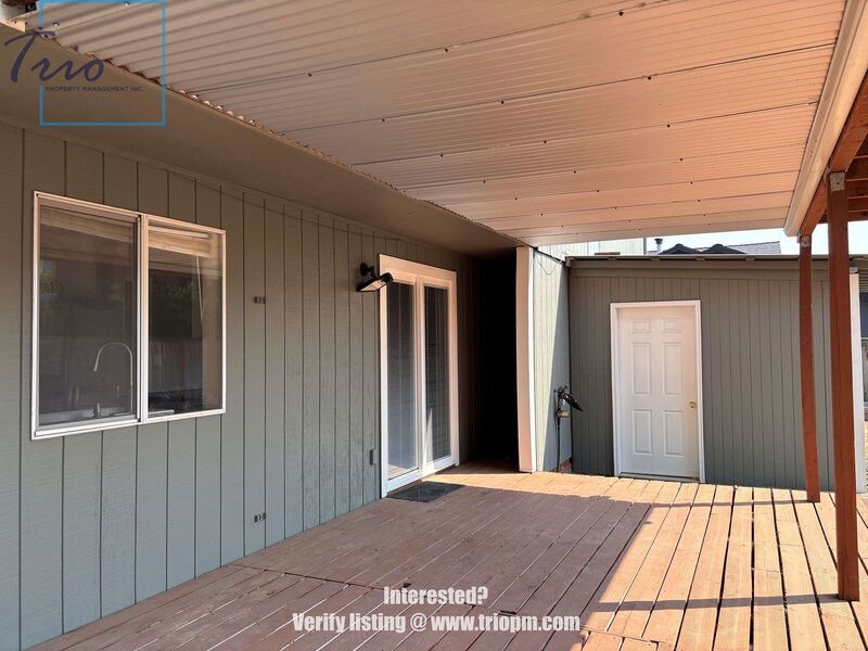 Spacious 3-Bedroom Home with Fenced Yard, Covered Deck and Two-Car Garage property image