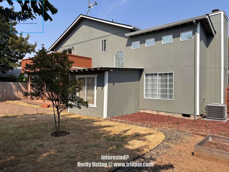 Spacious 3-Bedroom Home with Fenced Yard, Covered Deck and Two-Car Garage property image