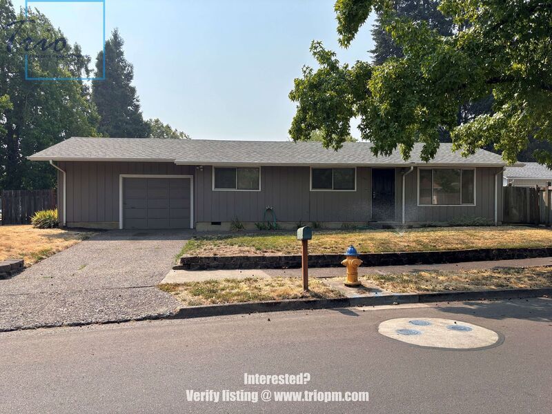 Spacious 3-Bedroom Duplex with Fireplace, Fenced Yard and Attached Garage property image