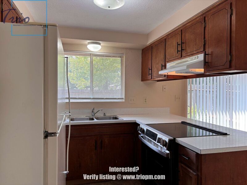 Spacious 3-Bedroom Duplex with Fireplace, Fenced Yard and Attached Garage property image