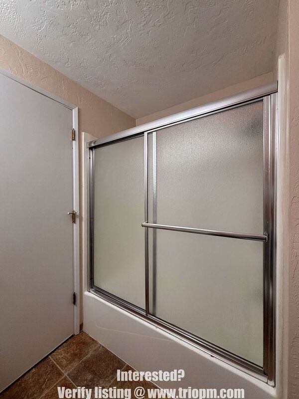 Spacious 3-Bedroom Duplex with Fireplace, Fenced Yard and Attached Garage property image