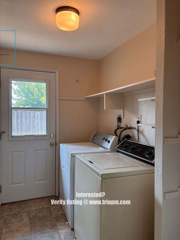 Spacious 3-Bedroom Duplex with Fireplace, Fenced Yard and Attached Garage property image
